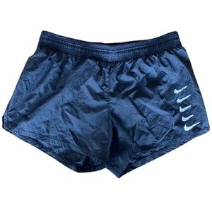 Women’s Nike nylon running shorts with liner.
